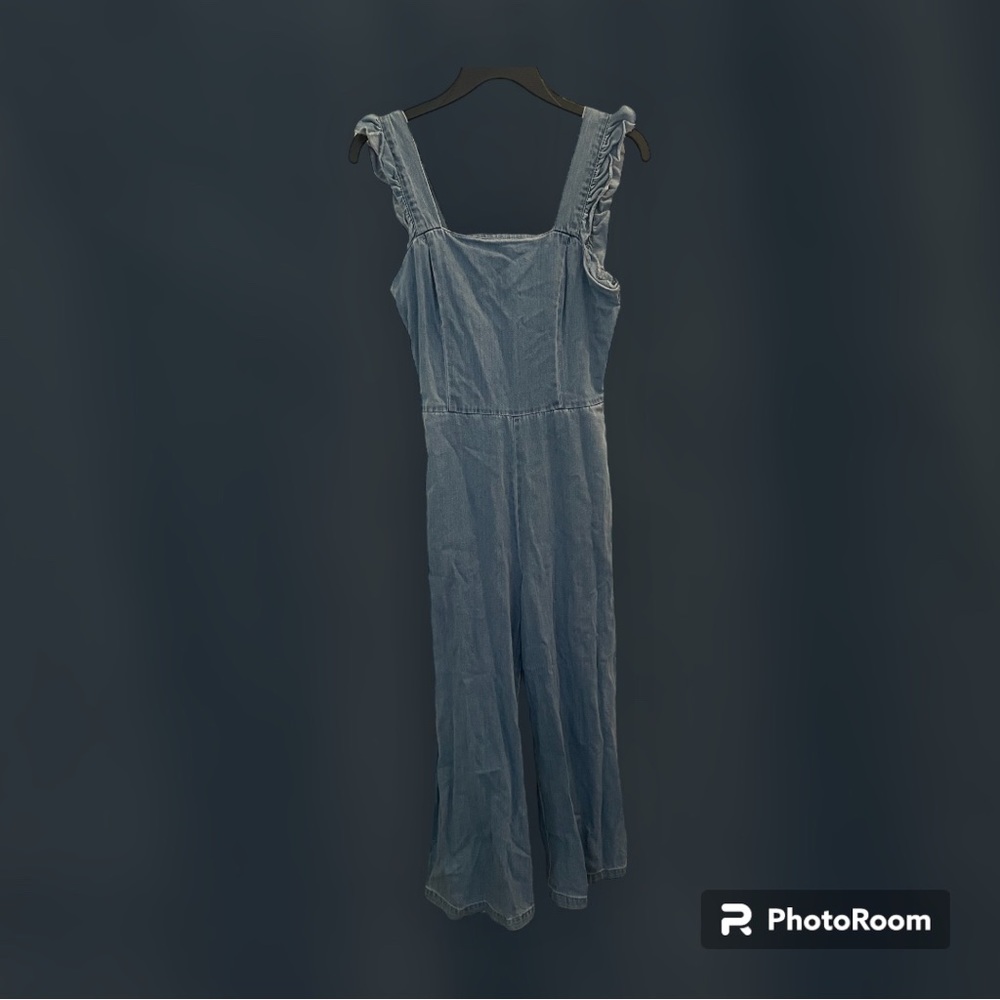 Blue overalls with ruffle straps